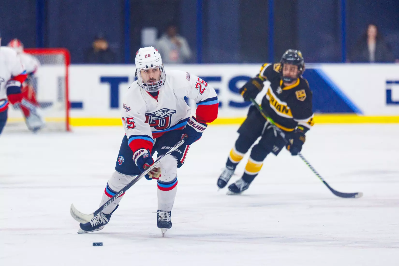 Liberty Men’s D1 Hockey hosts Adrian College for “Hall of Fame” Game in the Lahaye Hockey Center on January 31, 2025. (Photo by: Matt Reynolds)