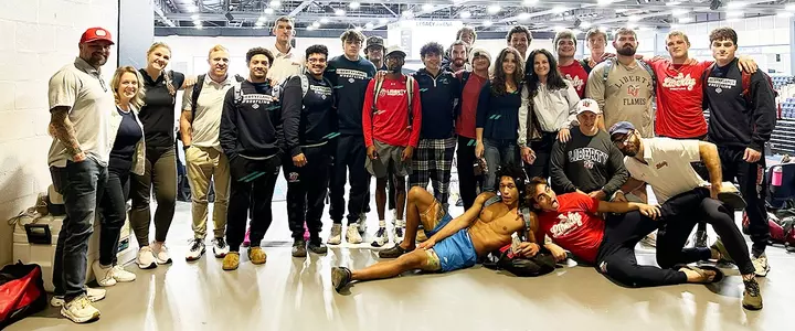 Liberty men's wrestlers at Life