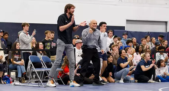 Liberty men's wrestling coaches Josh McIlhenny and Jesse Castro