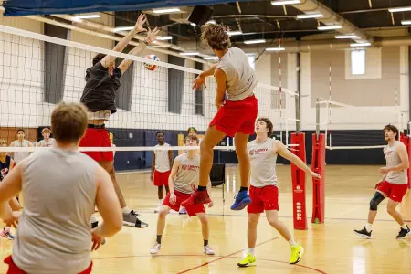 Jayden Rice spikes in practice for nationals