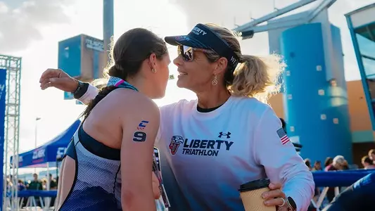 Heather Gollnick hugs Morgan Dalton after Triathlon Nationals