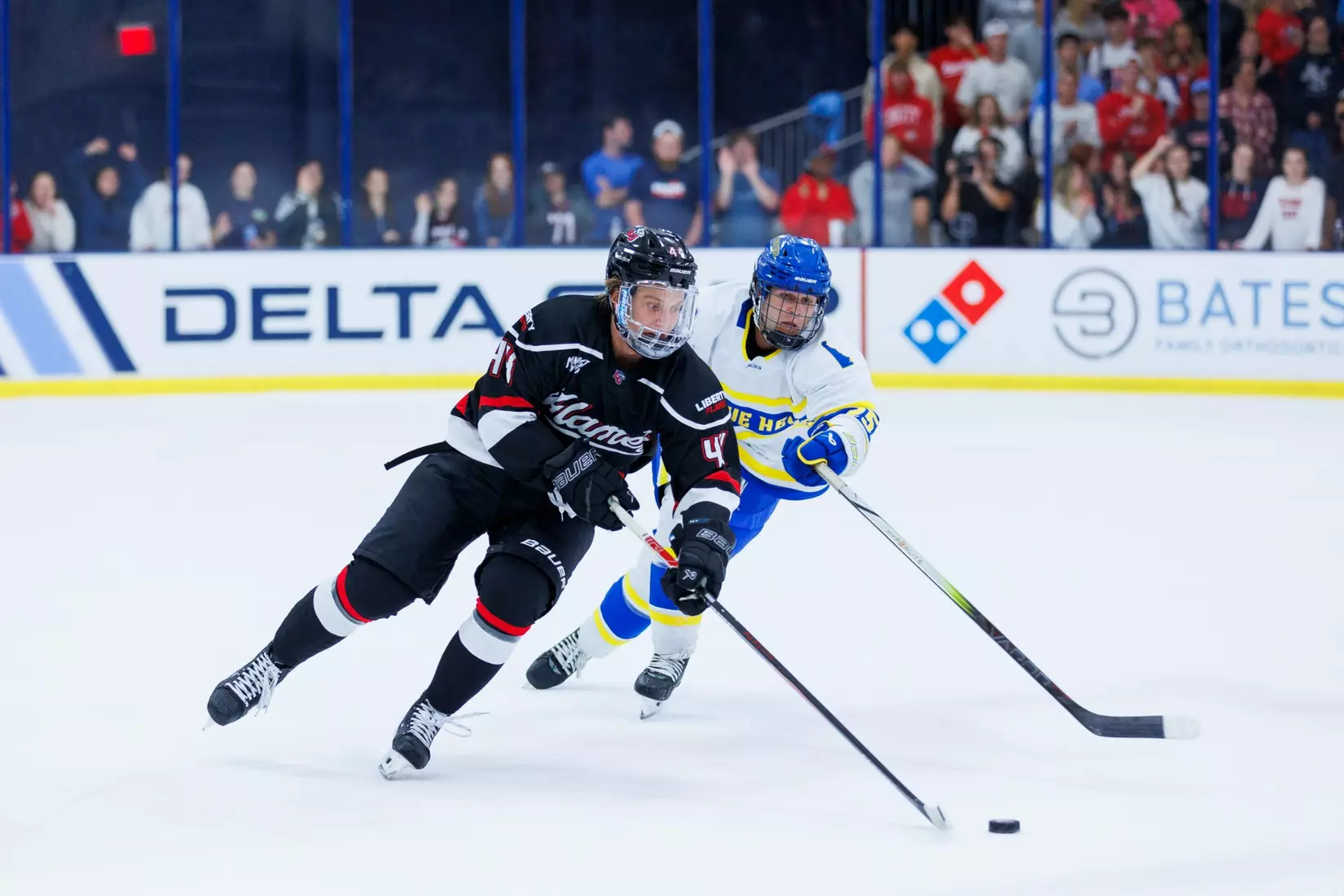 The Liberty Men’s D1 Hockey Team takes on Delaware at midnight for Midnight Mayhem in the Lahaye Ice Center on September 27th, 2025. (Photo by Grace Greer)
