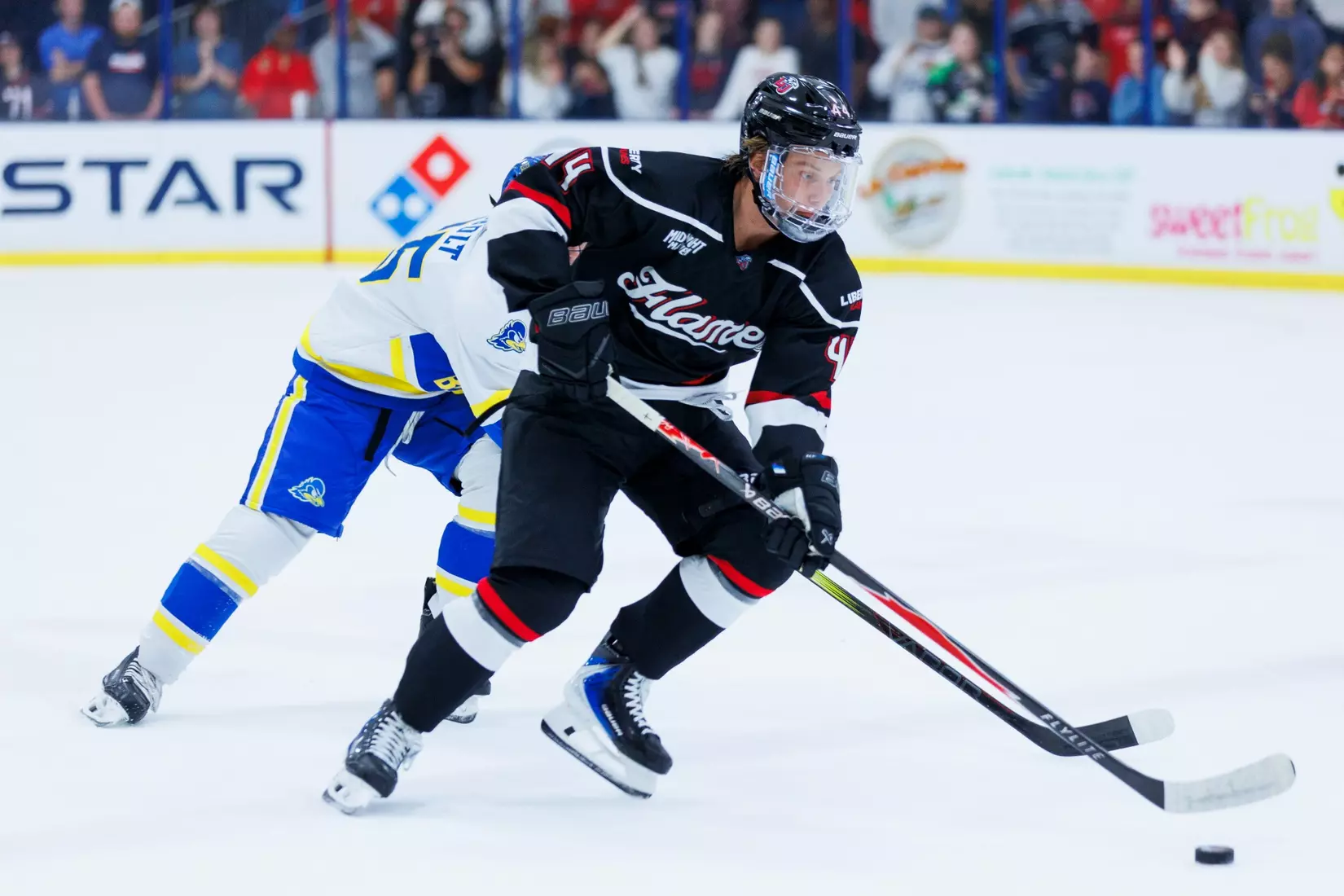 The Liberty Men’s D1 Hockey Team takes on Delaware at midnight for Midnight Mayhem in the Lahaye Ice Center on September 27th, 2025. (Photo by Grace Greer)