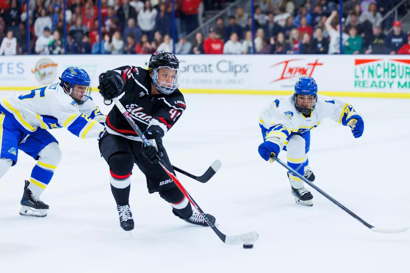 The Liberty Men’s D1 Hockey Team takes on Delaware at midnight for Midnight Mayhem in the Lahaye Ice Center on September 27th, 2025. (Photo by Grace Greer)
