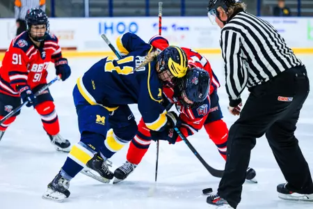 Brookelyn Beauchamp faceoff against Michigan