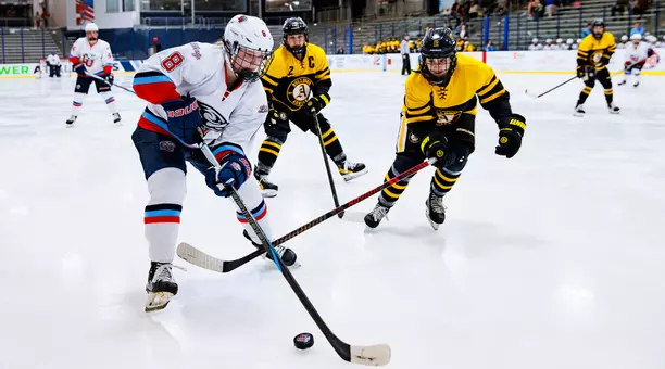 Ellie Sarauer skates against Adrian College