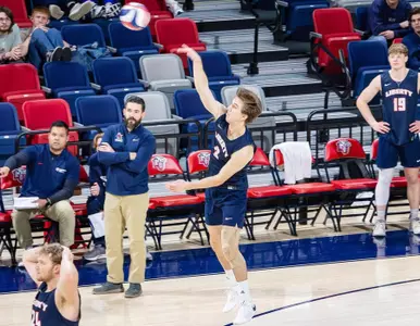 DI men's volleyball setter Josh Culpepper serves