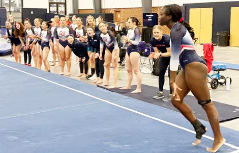 Mali Campbell cheered on by teammates