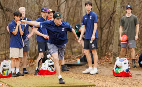 Liberty disc golfer Kal Essenmacher tees off