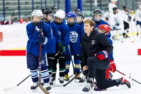 Liberty Hockey Camps counselor on ice