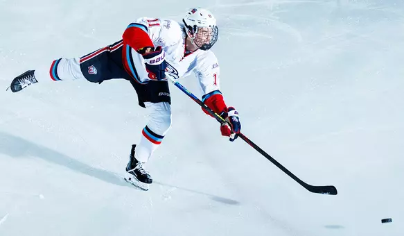 Flames forward Tucker Shields takes shot