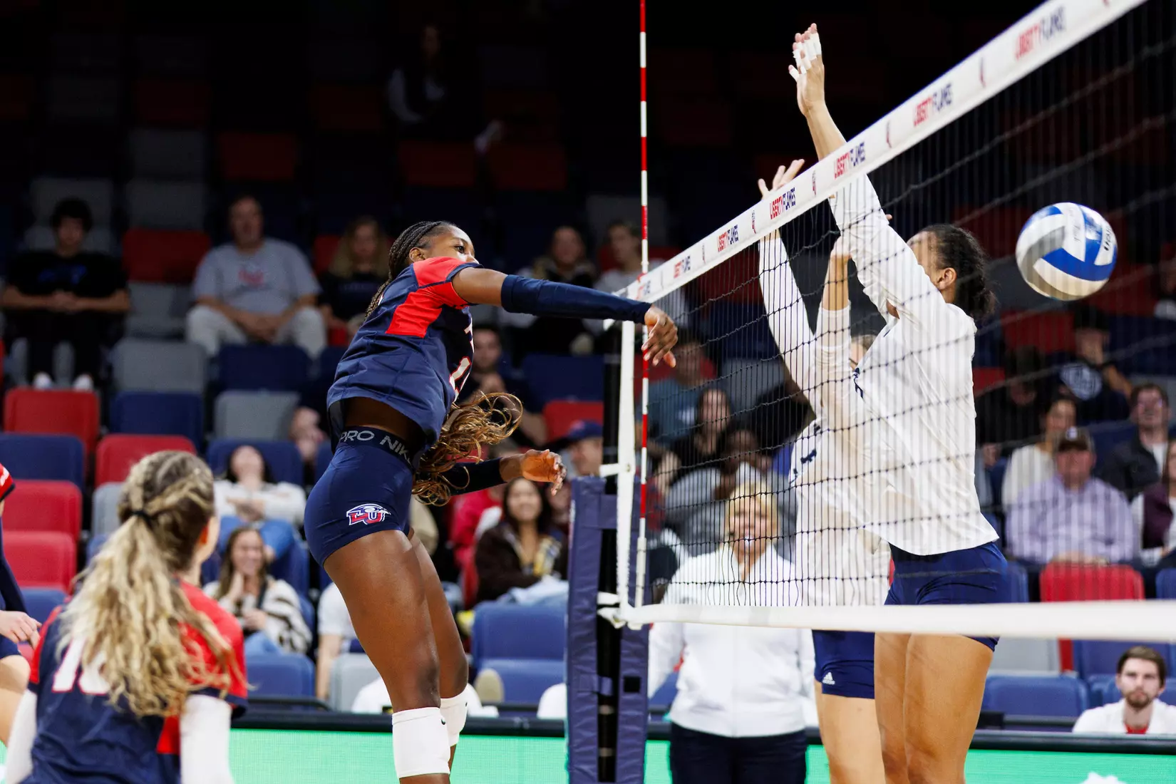 The Liberty University Women’s Volleyball team takes on the Florida International University Panthers at Liberty Arena on October 21, 2023 (Photo by: Chase Gyles)