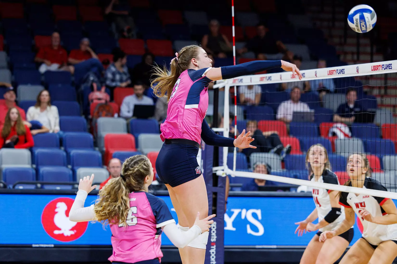 Liberty University’s Women’s Volleyball team takes on the Western Kentucky University Hilltoppers in the Liberty Arena on October 04, 2023 (Photo by: Chase Gyles)