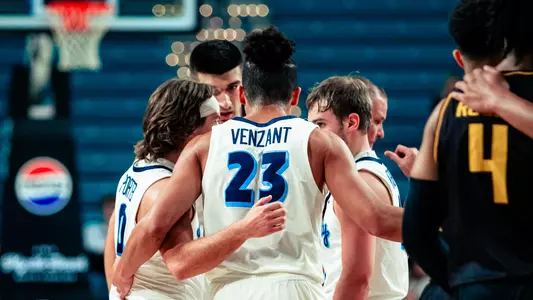 Men's Basketball Team Huddle Preview Photo vs. Vermont