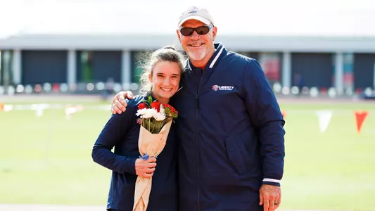 Taylen Langin with Coach Bingham Senior Day