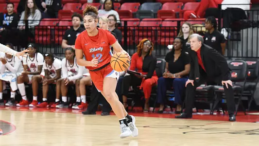 Asia Boone dribbling at Jax State