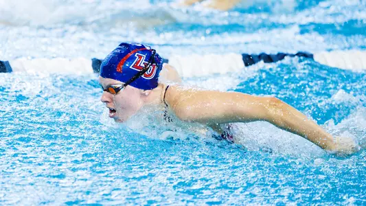 Liberty University’s Swim and Dive team competes in a meet vs. Campbell University at the Liberty University Natatorium on January 21, 2023. (Photo by: Chase Gyles)