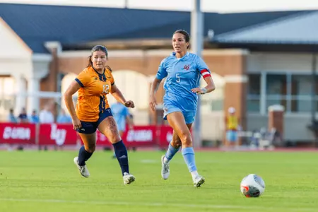 WSOC Ivy Garner dribbles