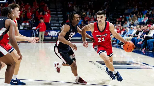 The Liberty University Men’s Basketball team takes on the New Mexico State Aggies in the Liberty Arena for an After Dark game on February 29, 2024. (Photo by: Chase Gyles)