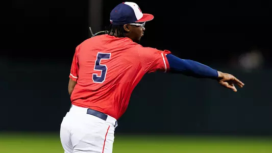 Foster throwing ball