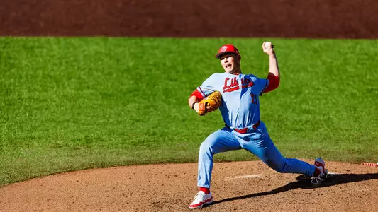 Cooper throwing pitch