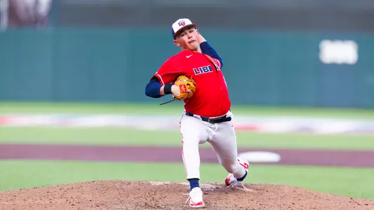 Cooper throwing pitch