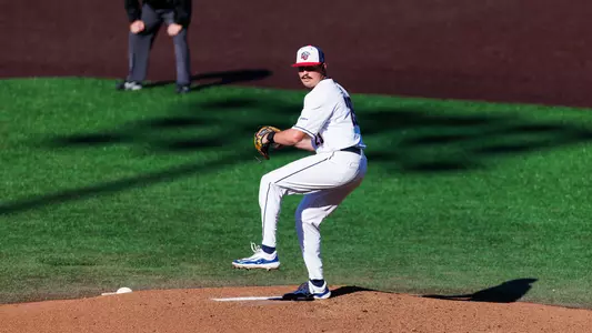 Butler throwing pitch