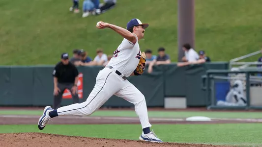 Butler throwing pitch