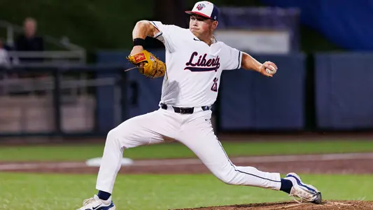 Cooper throwing pitch