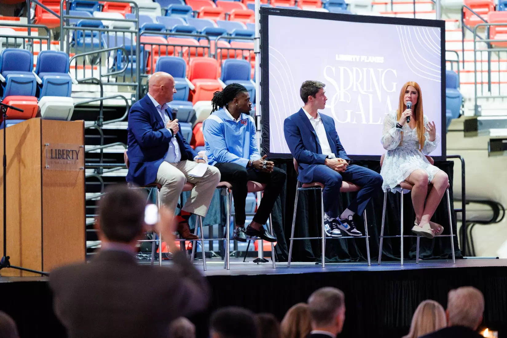 Liberty Athletics held it’s first annual auction, The Liberty Flames Spring Gala, on April 26, 2024. From Left: Alan York, Quinton Reese, Luke Eberle and Bethany Dykema (Photo by: Matt Reynolds)