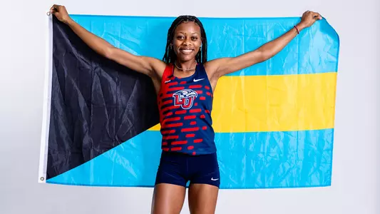 Indea Cartwright with Bahamas Flag