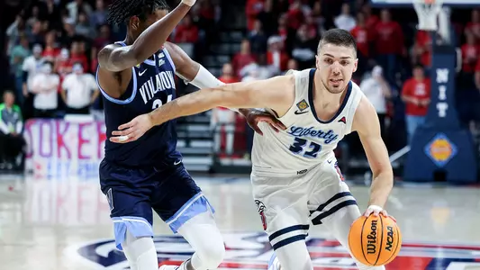 The Liberty Men’s Basketball team takes on Villanova in the first game of the NIT tournament on March 14, 2023. (Photo by Chase Gyles)