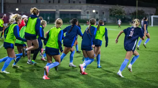 Women's Soccer Rushes the Field after a win