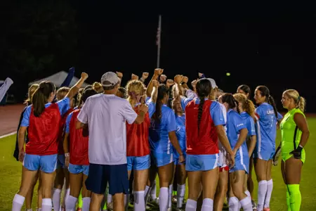 Women's Soccer breaks a huddle