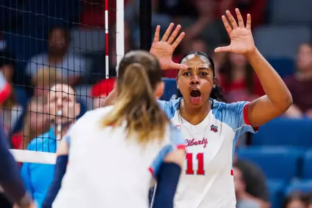 The Liberty University Women’s Volleyball team takes on the University of Virginia Cavaliers in the Liberty Arena on September 13, 2024. (Photo by: Matt Reynolds)