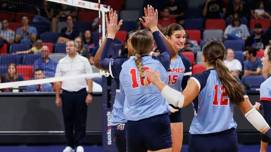 The Liberty University Women’s Volleyball team takes on West Virginia University in the Liberty Arena on September 15, 2024. (Photo by: Emily Cuthrell)