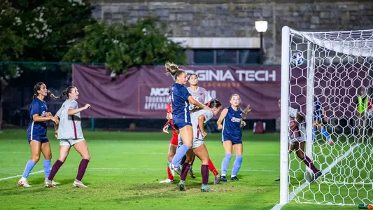 Halle Engle scores on a header