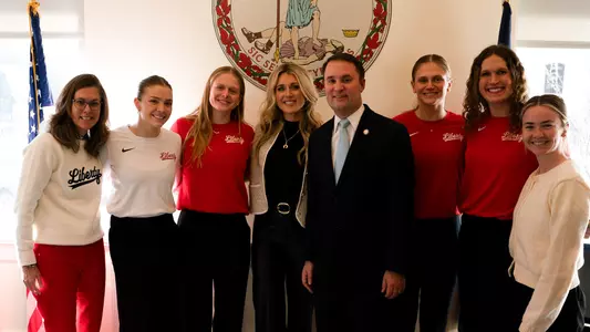 Athletics - Liberty Swim and Dive Student-Athletes at Women's Sports Rally