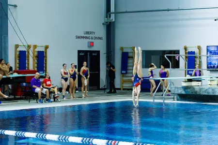 Liberty University’s Women’s Swim and Dive team face James Madison University at Liberty’s Natatorium on October 26th, 2024. (Photo by Ryan Anderson)