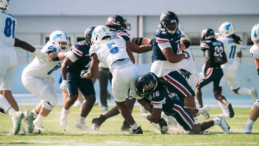 Football - Bahamas Bowl - Liberty vs Buffalo game recap photo defensive tackle (2024)