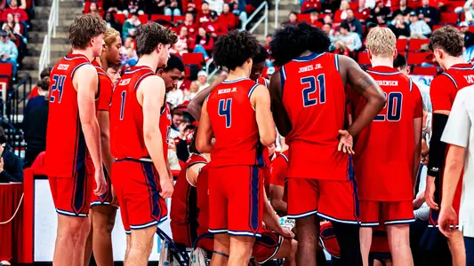 Men's Basketball Recap Photo Team Huddle at NC State Dec. 10, 2025