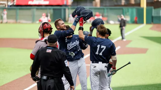 Baseball - Jaxson Sorenson Greeted at Home Plate After HR 2-16-25