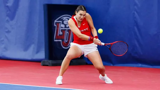 Radulova makes a backhanded shot