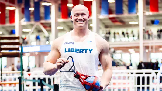 Kellen Kimes after breaking weight throw record