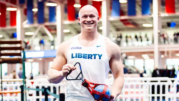 Kellen Kimes after breaking weight throw record