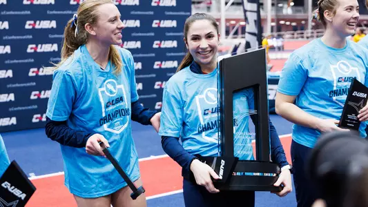 Meredith Engle with CUSA Indoor Trophy