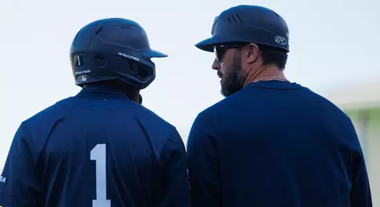 Baseball - Tanner Marsh talking with Coach Cox