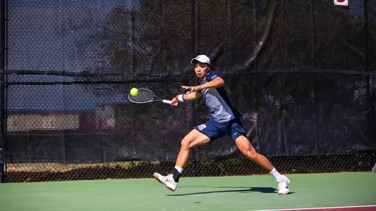 Auytayakul reaches for a forehand