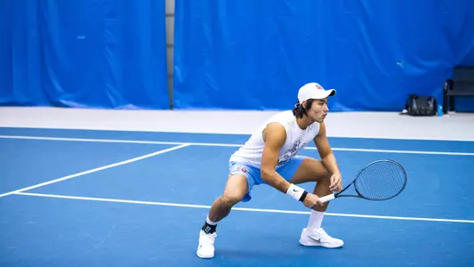 Auytayakul prepares for a point in doubles