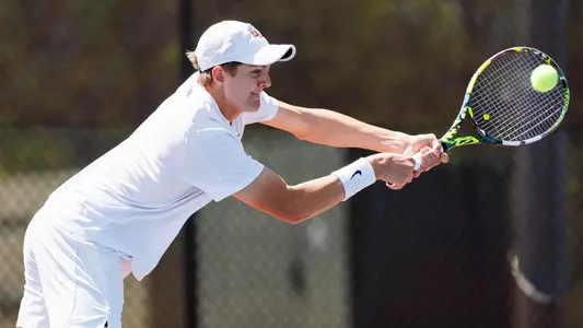 Gouws Reaches for a backhand